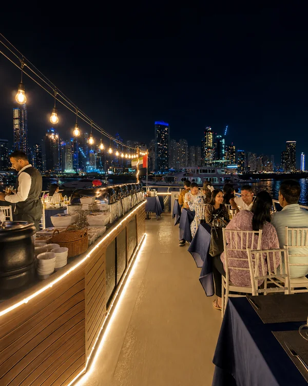 Guests on the illuminated deck
