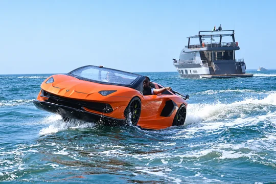 Orange Jet Car riding across the water