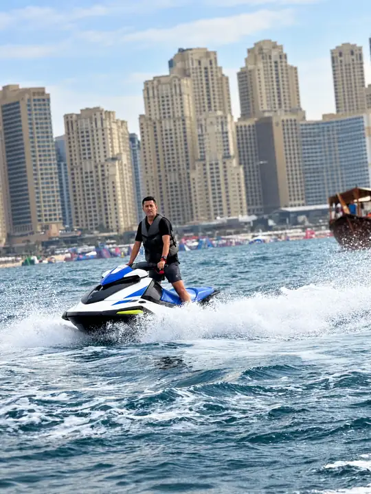 Jet Ski on the water with JBR buildings in the background